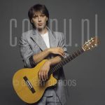 Harry Sacksioni (Date Unknown) at studio in Amsterdam.

[keywords]Posed, Half Length, Eyecontact, Guitar[/keywords]